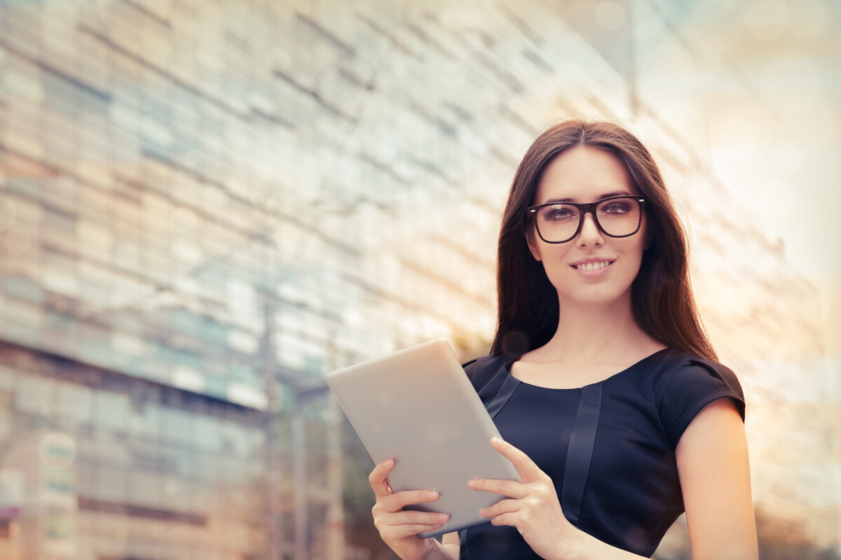 bigstock-young-woman-with-tablet-out-in-68606755-scaled-1